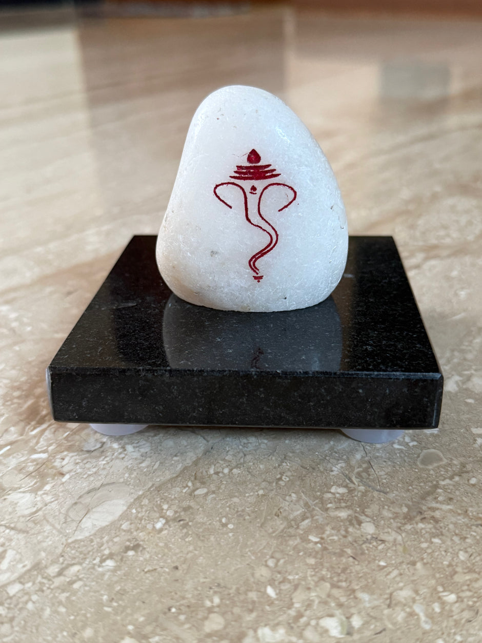 Ganesh marble engraving with jet black granite stand (Assorted size)
