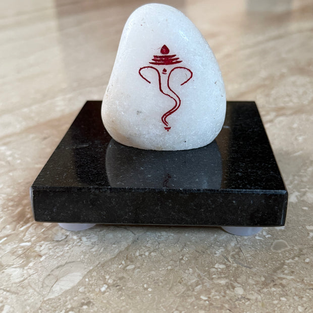 Ganesh marble engraving with jet black granite stand (Assorted size)