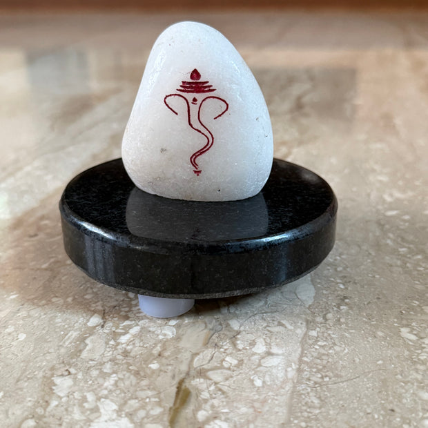 Ganesh marble engraving with jet black granite stand (Assorted size)
